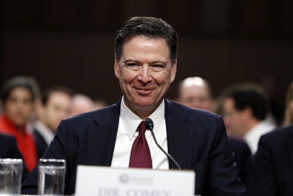 James Comey Former FBI Director James Comey smiles during a Senate Intelligence Committee hearing on Capitol Hill, Thursday, June 8, 2017, in Washington.
