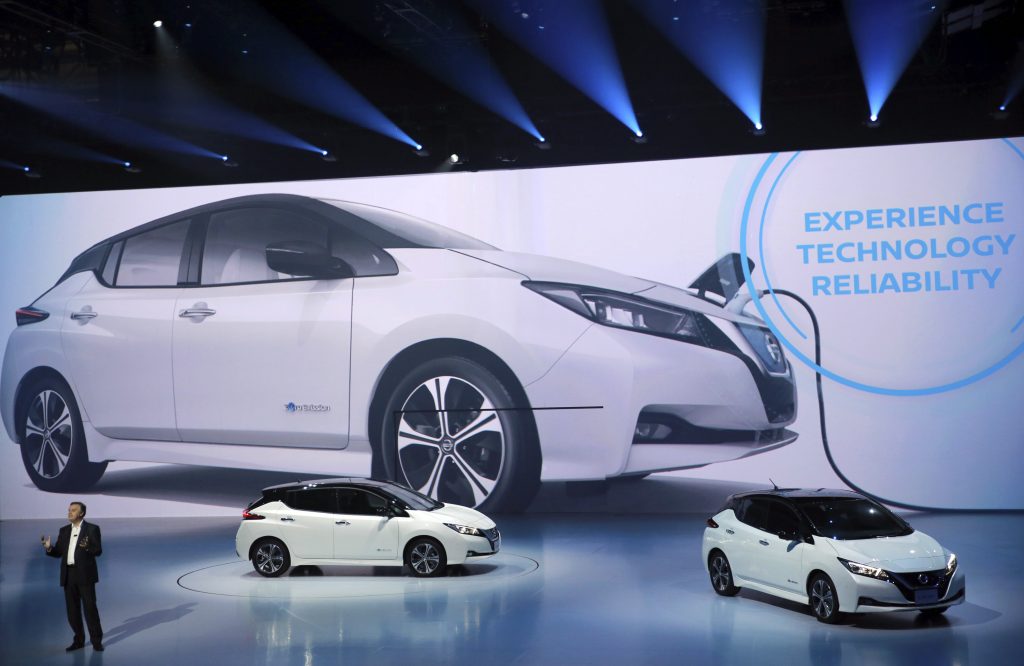 Daniele Schillaci, head of global sales and marketing and also the Zero Emission Vehicle and Battery Business for Nissan, speaks during the world premiere in Chiba, near Tokyo Wednesday, Sept. 6, 2017. Nissan's new Leaf electric car goes father on a charge and comes with autonomous drive technology and single-pedal driving. But whether it can catch on with anyone but the most zealously green-minded remains to be seen. (Eugene Hoshiko/AP Photo)