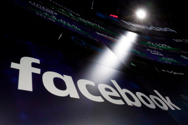 AP_18094667693740-768×512 In this March 29, 2018, file photo, the logo for Facebook appears on screens at the Nasdaq MarketSite in New York's Times Square. Facebook CEO Mark Zuckerberg is set to testify before a House oversight panel on April 11 as Congress and U.S. regulators consider how to deal with the social media giant amid a privacy scandal. (Richard Drew/AP Photo, File)