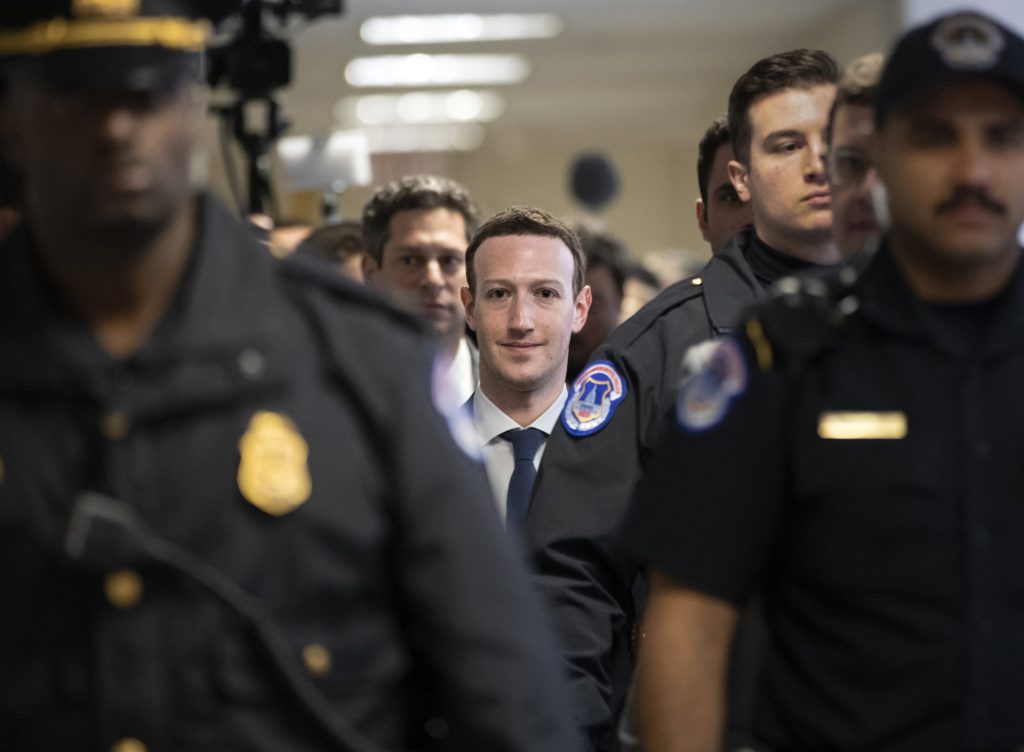 Facebook CEO Mark Zuckerberg arrives on Capitol Hill in Washington, Monday, April 9, 2018