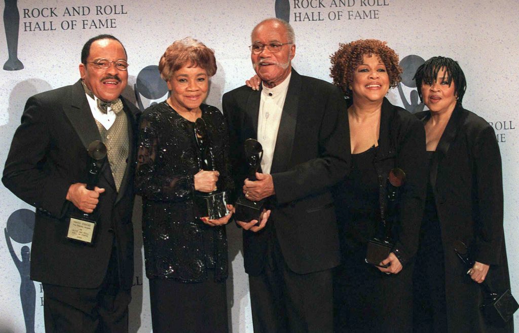 FILE - This March 15, 1999 file photo shows the sibling group The Staples Singers, from left, Pervis, Cleotha, Pops, Mavis, and Yvonne at the Rock and Roll Hall of Fame induction ceremony in New York. Yvonne Staples, whose voice and business acumen powered the success of her family's Staples Singers gospel group, has died at age 80. The Chicago funeral home Leak and Sons says that she died Tuesday, April 10, 2018 at home in Chicago. (AP Photo/Albert Ferreira, file)