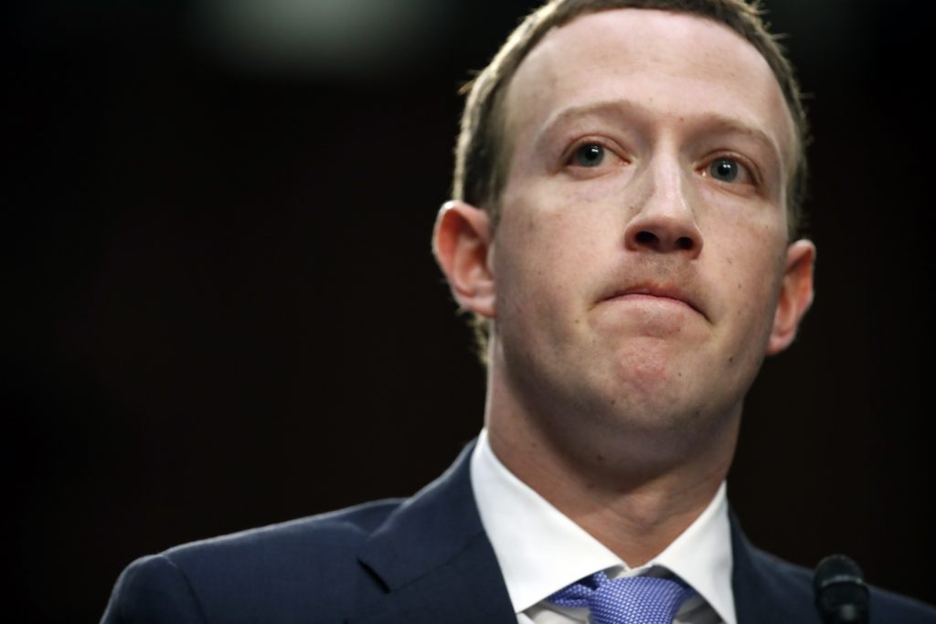 Mark Zuckerberg Facebook CEO Mark Zuckerberg pauses while speaking as he testifies before a joint hearing of the Commerce and Judiciary Committees on Capitol Hill in Washington, Tuesday, April 10, 2018