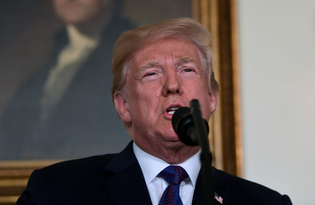 Donald Trump President Donald Trump speaks in the Diplomatic Reception Room of the White House on Friday, April 13, 2018, in Washington, about the United States' military response to Syria's chemical weapon attack on April 7. (Susan Walsh/AP Photo)