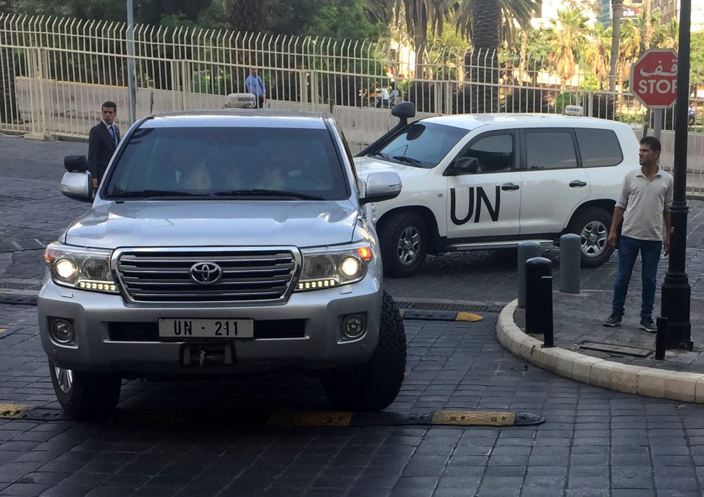 Chemical Weapons OPCW Glance In this Saturday, April 14, 2018 file photo, UN vehicles carrying the team of the Organization for the Prohibition of Chemical Weapons (OPCW), arrive at hotel hours after the U.S., France and Britian launched an attack on Syrian facilities for suspected chemical attack against civilians, in Damascus, Syria. The OPCW has been thrust once again into the international limelight by a nerve agent attack on a former Russian spy in Britain and allegations of a chemical bombardment on the Syrian city of Douma. It is now attempting to investigate, but its experts have not yet been able to visit the scene. (Bassem Mroue/AP Photo, File)