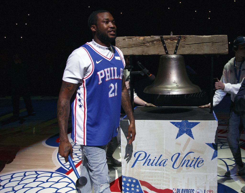 Heat 76ers Basketball Rapper Meek Mill comes out to ring a Liberty Bell replica before the first half in Game 5 of a first-round NBA basketball playoff series between the Miami Heat and the Philadelphia 76ers, Tuesday, April 24, 2018, in Philadelphia. (AP Photo/Chris Szagola)