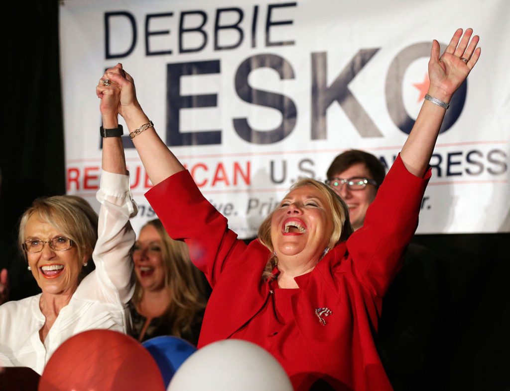 APdebbieleskox1200 Republican U.S. Congressional candidate Debbie Lesko, right, celebrates her win with former Arizona Gov. Jan Brewer at her home, Tuesday, April 24, 2018, in Peoria, Ariz. Lesko ran against Democratic candidate Hiral Tipirneni for Arizona's 8th Congressional District seat being vacated by U.S. Rep. Trent Franks, R-Arizona. (Matt York/AP Photo)