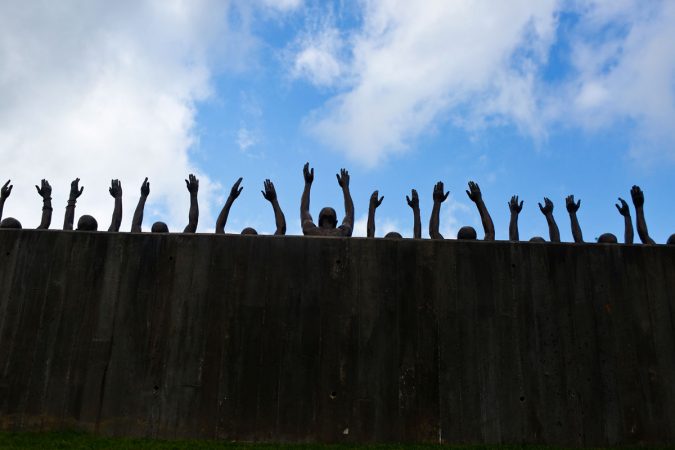 This photo shows a bronze statue called 