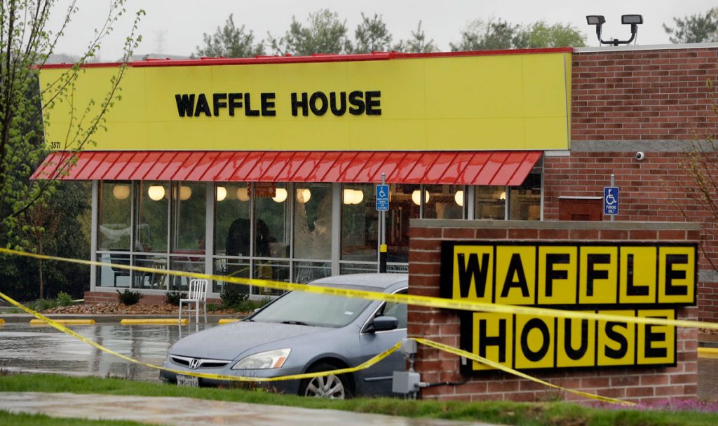 APwafflehouseshootingscenex1200 Police tape blocks off a Waffle House restaurant Sunday, April 22, 2018, in Nashville, Tenn. At least four people died after a gunman opened fire at the restaurant early Sunday. (Mark Humphrey/AP Photo)