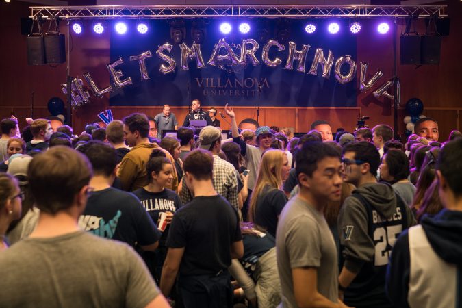 Villanova students gather at the Connelly Center to watch the 
men's basketball team play in the NCAA Championship against Michigan. (Branden Eastwood for WHYY)