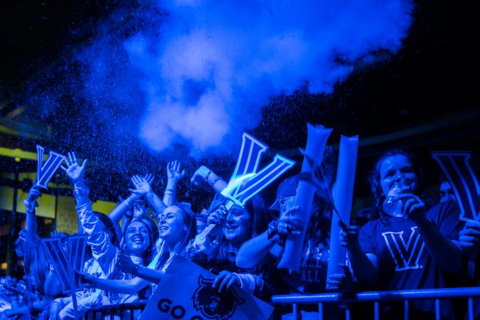 Villanova students gather at the Connelly Center to watch the 
men's basketball team play in the NCAA Championship against Michigan. (Branden Eastwood for WHYY)