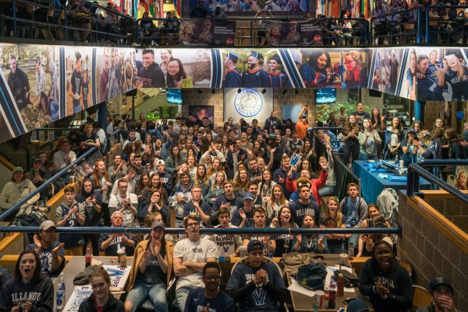 Villanova students gather at the Connelly Center to watch the 
men's basketball team play in the NCAA Championship against Michigan. (Branden Eastwood for WHYY)