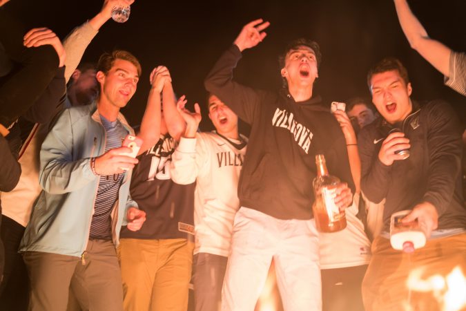 Villanova students celebrates as the men's basketball team wins the NCAA championship. (Branden Eastwood for WHYY)