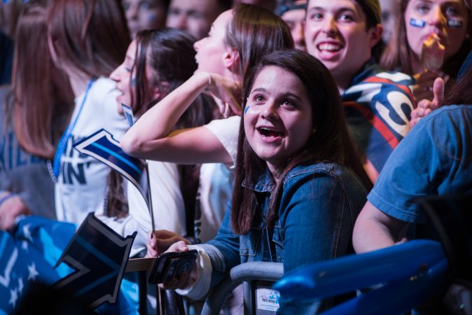 Villanova students gather at the Connelly Center to watch the men's basketball team play in the NCAA championship against Michigan. (Branden Eastwood for WHYY)