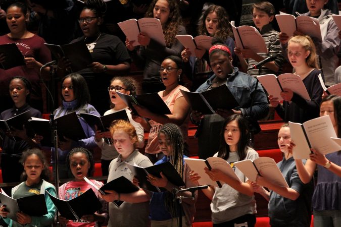 The Westminster Symphonic Choir, the Keystone State Boychoir, the Pennsylvania Girlchoir, and the Sister Cities Girlchoir, perform with the Philadelphia Orchestra. (Emma Lee/WHYY)