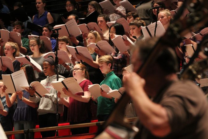The Westminster Symphonic Choir, the Keystone State Boychoir, the Pennsylvania Girlchoir, and the Sister Cities Girlchoir, perform with the Philadelphia Orchestra. (Emma Lee/WHYY)
