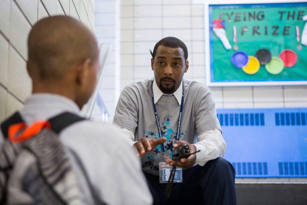 IMG_8429_SFW Jovan Weaver speaking to a student at Wister Elementary on the first day of school in August 2016. (Jessica Kourkounis/WHYY)