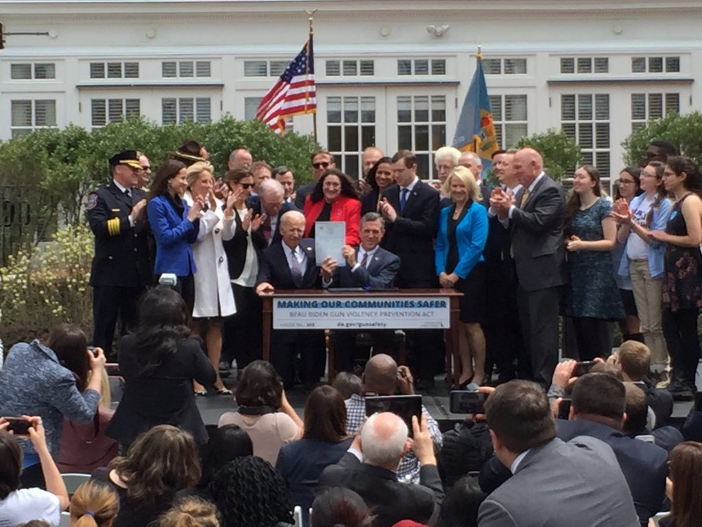Beau Biden gun bill Delaware Gov. John Carney signs the Beau Biden Gun Violence Prevention Act at the Biden Institute on the University of Delaware's Newark campus. (Paul Parmelee/WHYY)