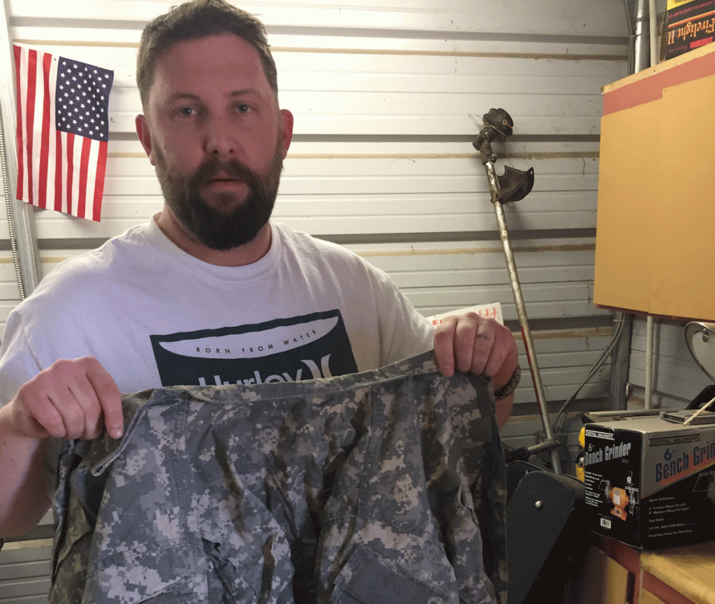 Tom-Holding-Uniform-TOday Veteran Thomas Fitzinge holding his uniform. (Provided)