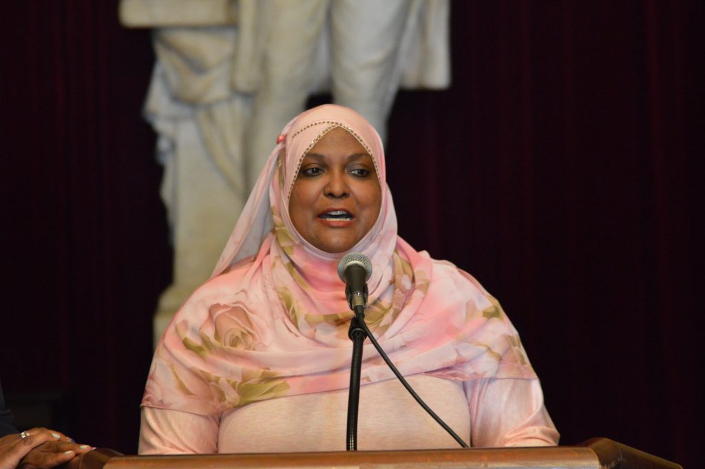 ali Stephanie Ali talks to those assembled at Philadelphia's City Hall at a ceremony honoring social workers. (Tom MacDonald/WHYY)