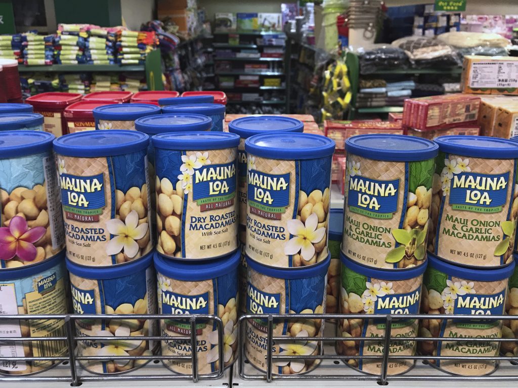Imported nuts from the United States are displayed for sale at a supermarket in Beijing, Monday, April 2, 2018. China raised import duties on U.S. pork, fruit and other products Monday. Imported nuts from the United States are displayed for sale at a supermarket in Beijing, Monday, April 2, 2018. China raised import duties on U.S. pork, fruit and other products Monday.