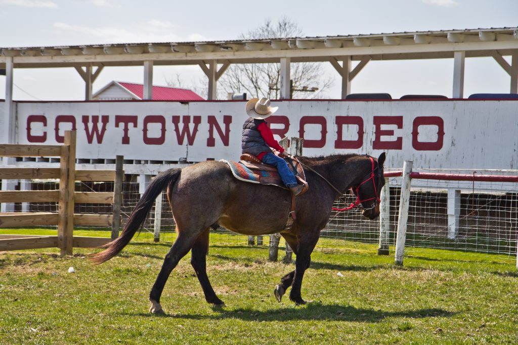 cowtown rodeo-5 Nate, the Harris family’s grandson, rides in pastures of the Cowtown Rodeo in Pilesgrove Township, N.J. (Kimberly Paynter/WHYY)