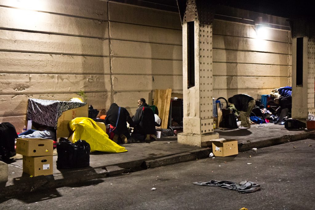 emerald street Since the cleanup of the Conrail tracks in Kensginton, many living there have moved to live beneath the overpass at Emerald and Lehigh Streets. (Kimberly Paynter/WHYY)