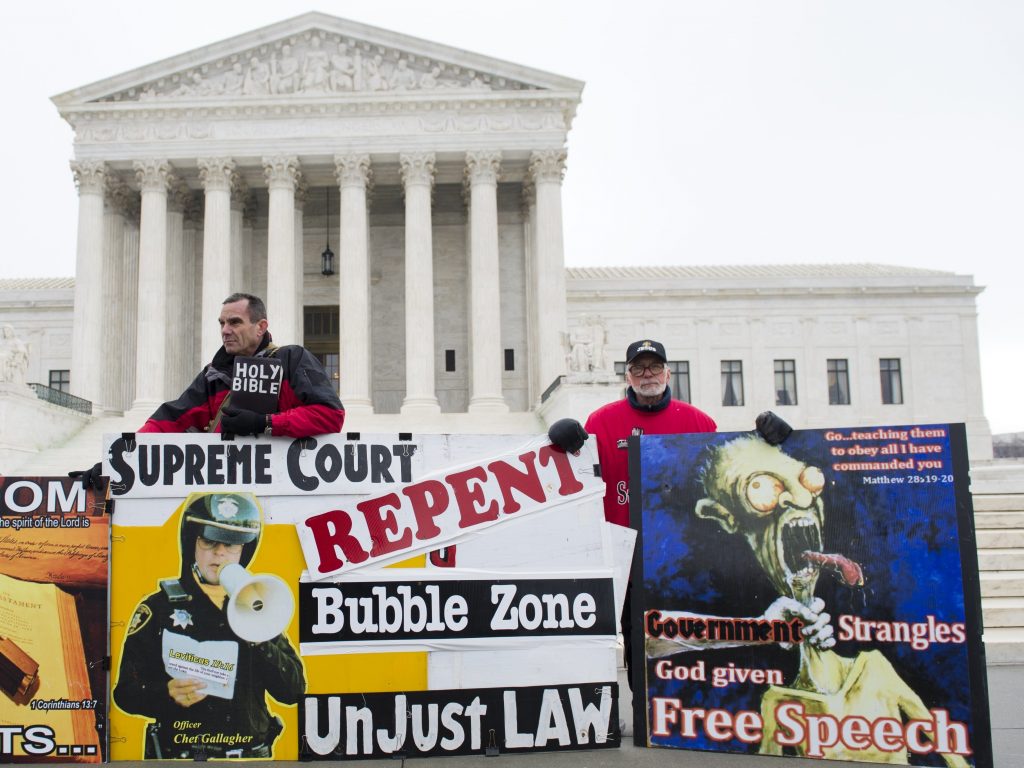 Anti-abortion-rights demonstrators stand outside the U.S. Supreme Court in 2014 after oral arguments over buffer zones around abortion clinics. Anti-abortion-rights demonstrators stand outside the U.S. Supreme Court in 2014 after oral arguments over buffer zones around abortion clinics. (Saul Loeb/AFP/Getty Images)