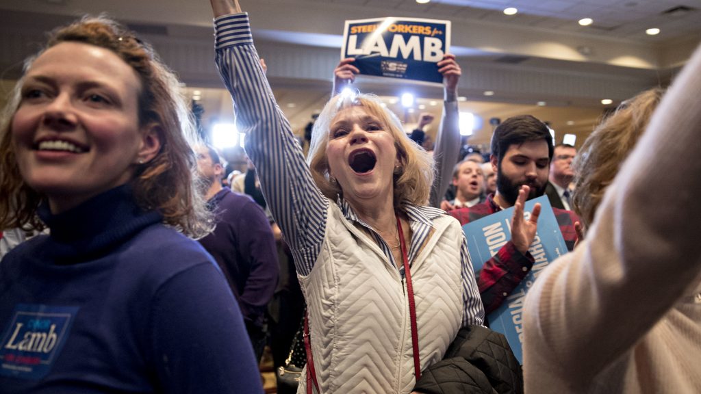 Supporters cheer at an election night rally in Canonsburg, Pa., for Democrat Conor Lamb, whose victory got a boost from suburban voters. Supporters cheer at an election night rally in Canonsburg, Pa., for Democrat Conor Lamb, whose victory got a boost from suburban voters.
(Bloomberg via Getty Images)