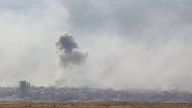 Smoke billows in Douma, Syria, on Saturday. The White House says President Trump is weighing military action following an alleged chemical attack in the town. (AFP/Getty Images)