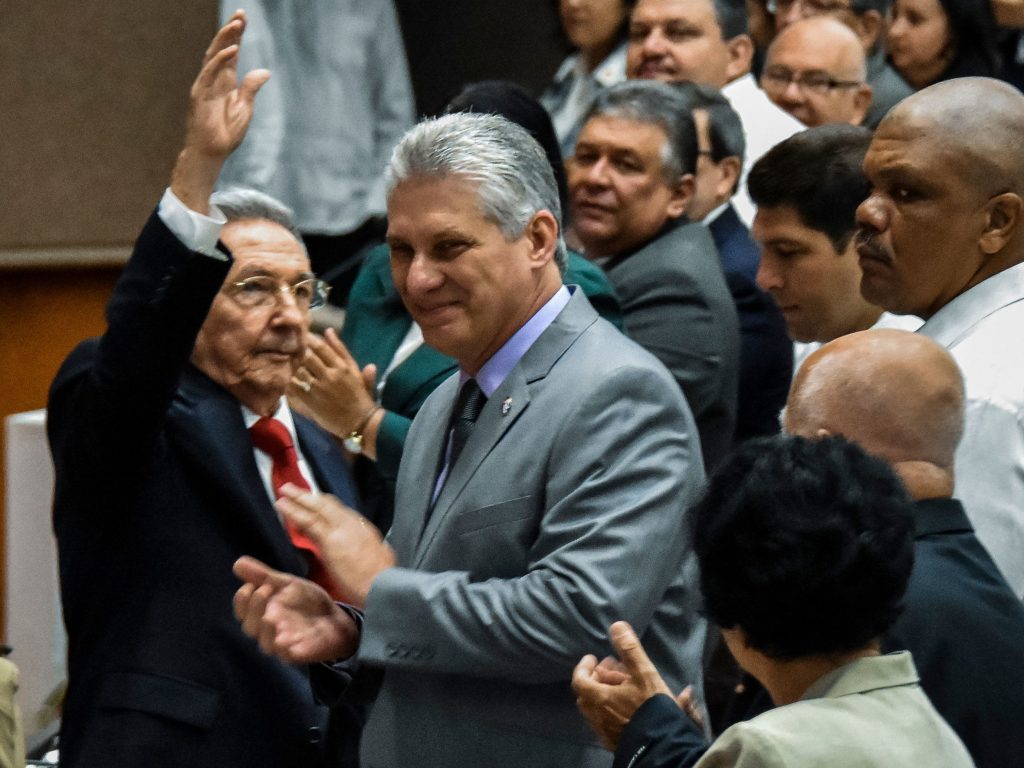 Cuban President Raul Castro waves to the room as First Vice President Miguel Diaz-Canel, Castro’s handpicked successor, claps at the National Assembly session Wednesday in Havana. Cuban President Raul Castro waves to the room as First Vice President Miguel Diaz-Canel, Castro's handpicked successor, claps at the National Assembly session Wednesday in Havana. (STR/AFP/Getty Images)