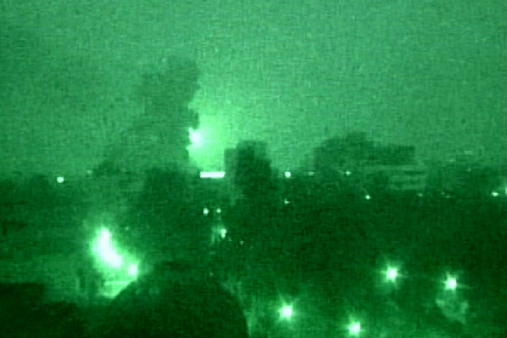 Iraq U.S. war A cloud of smoke rises following a U.S.-led air strike attack near Baghdad on arch 20, 2003.