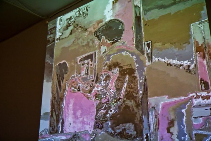 Projected work by artist Zach Nader in Phantom Limb at the Esther Klein Gallery. (Kimberly Paynter/WHYY)