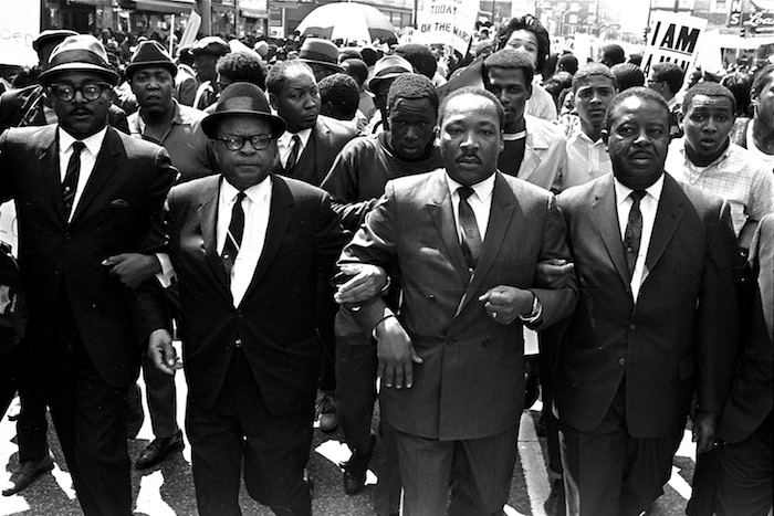 CIVIL RIGHTS LEADERS MARCH The Rev. Ralph Abernathy, right, and Bishop Julian Smith, left, flank Dr. Martin Luther King, Jr., during a civil rights march
