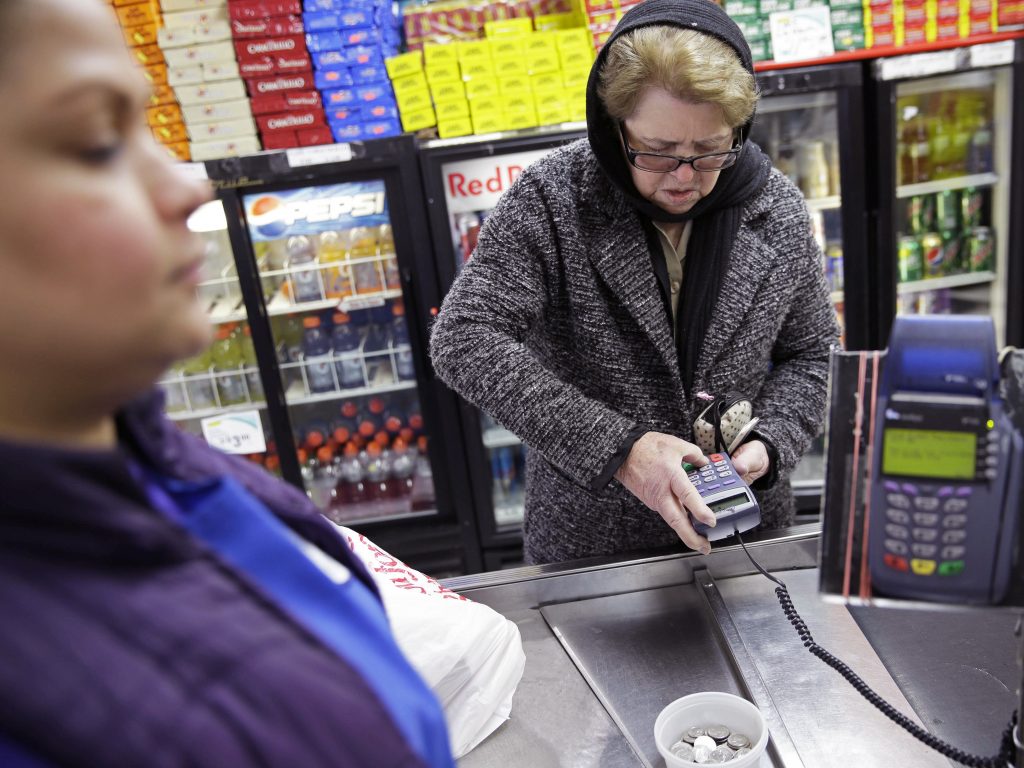 Hilda Herrera of New York state is one of 40,000 people who rely on the SNAP program for help buying groceries. Hilda Herrera of New York state is one of 40,000 people who rely on the SNAP program for help buying groceries. (Seth Wenig/AP)