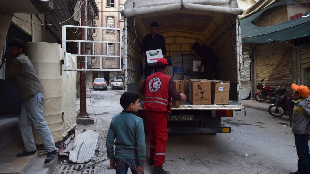 A U.N. convoy carrying aid enters Douma, a besieged town in eastern Ghouta, Syria in March. A U.N. convoy carrying aid enters Douma, a besieged town in eastern Ghouta, Syria in March. (Mouneb Taim /Anadolu Agency/Getty Images)
