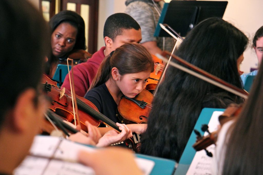 2018 05 05-e lee-philadelphia first presbyterian church-musicopia suite Meara Lim-Goyette, 11, (center) rehearses with Musicopia, for a performance of Mark Laycock's