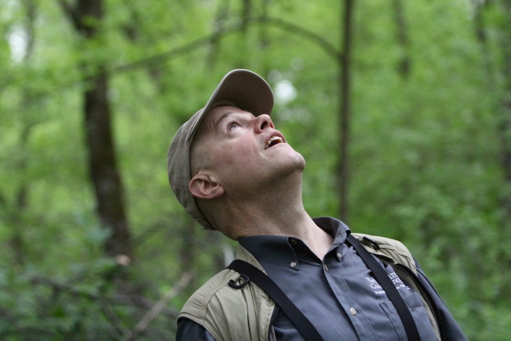 2018-05-10-e-lee-bill-kunze-philadelphia-timicum-wildlife-refuge-nature-conservancy-bird-count2-resized-1920×1280 Pennsylvania Nature Conservancy executive director Bill Kunze looks for birds at the John Heinz National Wildlife Refuge in Philadelphia during the annual spring migration. (Emma Lee/WHYY)