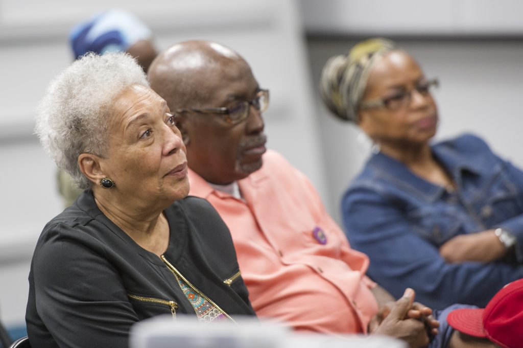 MALCOLM X 3 Audience members listen to speakers at event about Malcolm X. (Jonathan Wilson for WHYY)