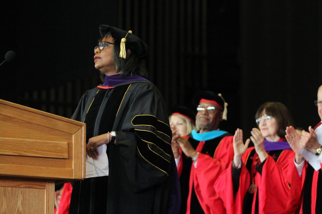 Keynote speaker Anita Hill receives a standing ovation at Rutgers Camden law school graduation. She also received an honorary doctor of law degree.