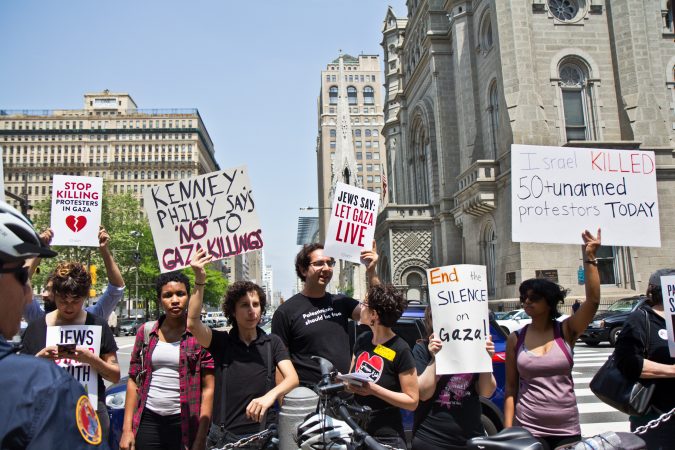 The local chapter of Jewish Voice for Peace protested the raising of the flag of Israel at City Hall in Philadelphia Monday. (Kimberly Paynter/WHYY)