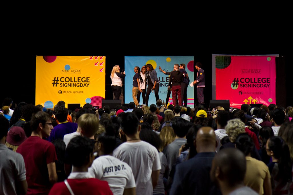 2018 5 2 k paynter students college signing day girls high students-2 Philadelphia High School seniors take photos with Michelle Obama, Rebel Wilson, Robert De Niro, and Bradley Cooper. (Kimberly Paynter/WHYY)