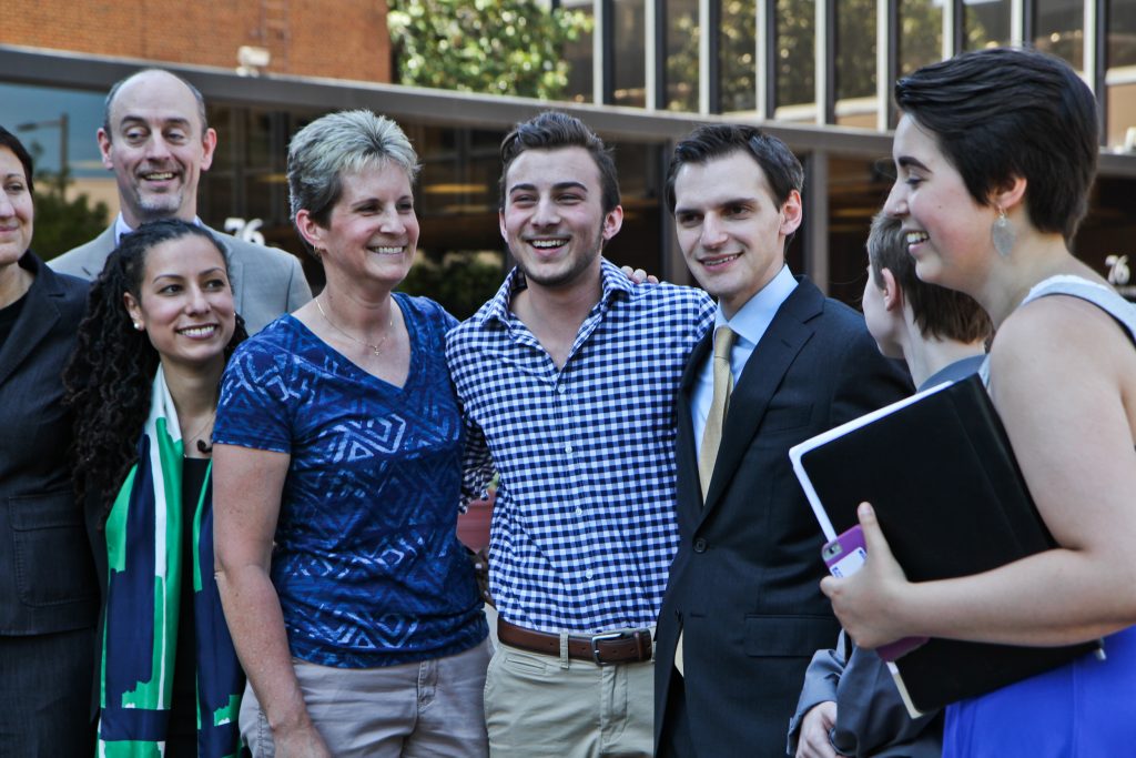 2018 5 23 k paynter boyertown aidan destefano Aidan Destefano (center, checkered shirt) outside of the Philadelphia Federal Courthouse with his legal representation. (Kimberly Paynter/WHYY)