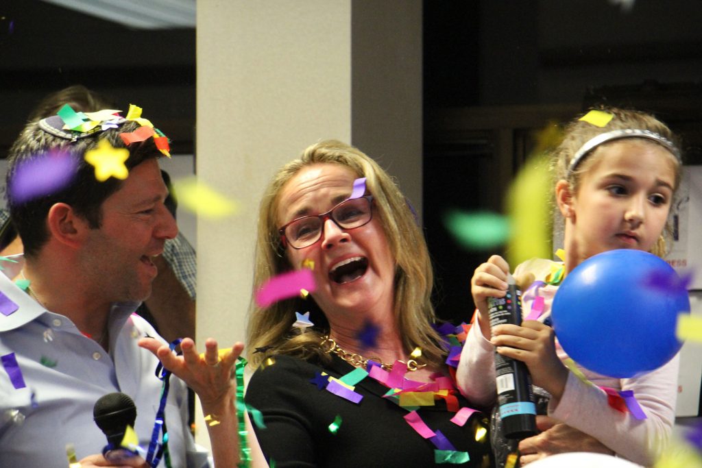 20180515-e-lee-dean-victory-primary Madeleine Dean celebrates a victory in the Democratic primary for Pennsylvania’s 4th Congressional District with Rabbi Larry Sernovitz and granddaughter Aubrey Cunnane, 6.