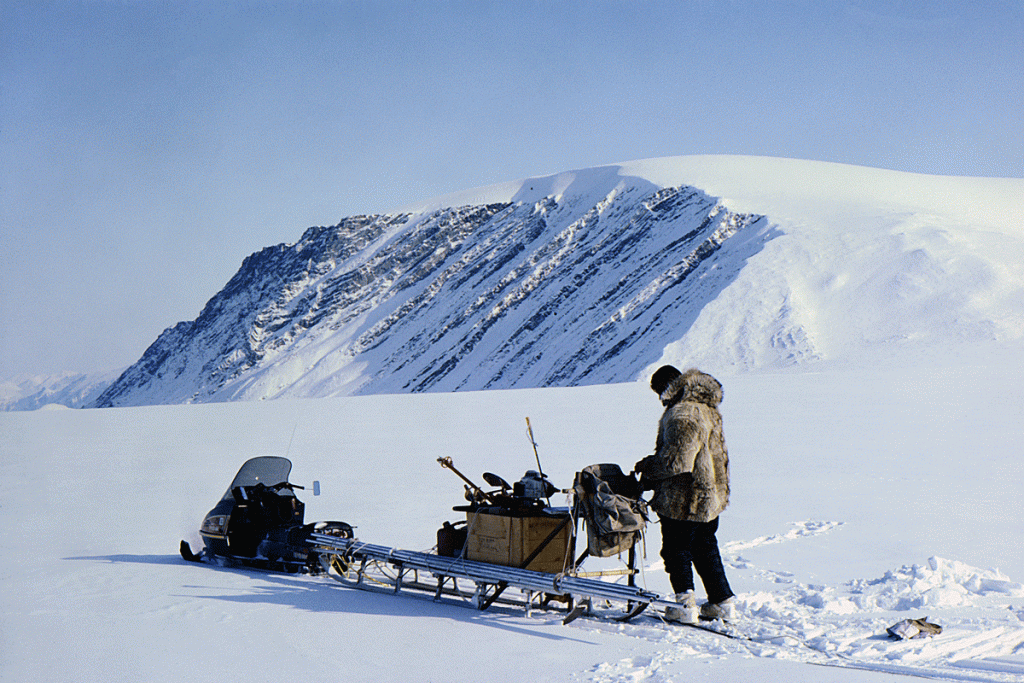 4-4 Canadian glaciologist Roy (Fritz) Koerner working on a glacier in April, 1983. (Image courtesy of Mark Serreze)