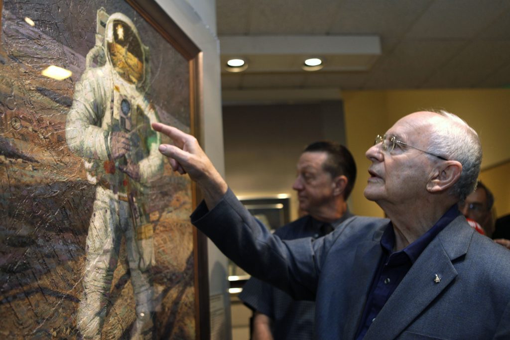 Alan Bean In this July 15, 2009 file photo, Apollo 12 astronaut Alan Bean walks through the largest exhibition of his artwork to date, inspired by his experience walking on the moon, to celebrate the 40th anniversary of the first Apollo moon landing, in Washington. Bean, the Apollo and Skylab astronaut, fourth human to walk on the moon and an accomplished artist, has died. (Jacquelyn Martin/AP Photo, File)