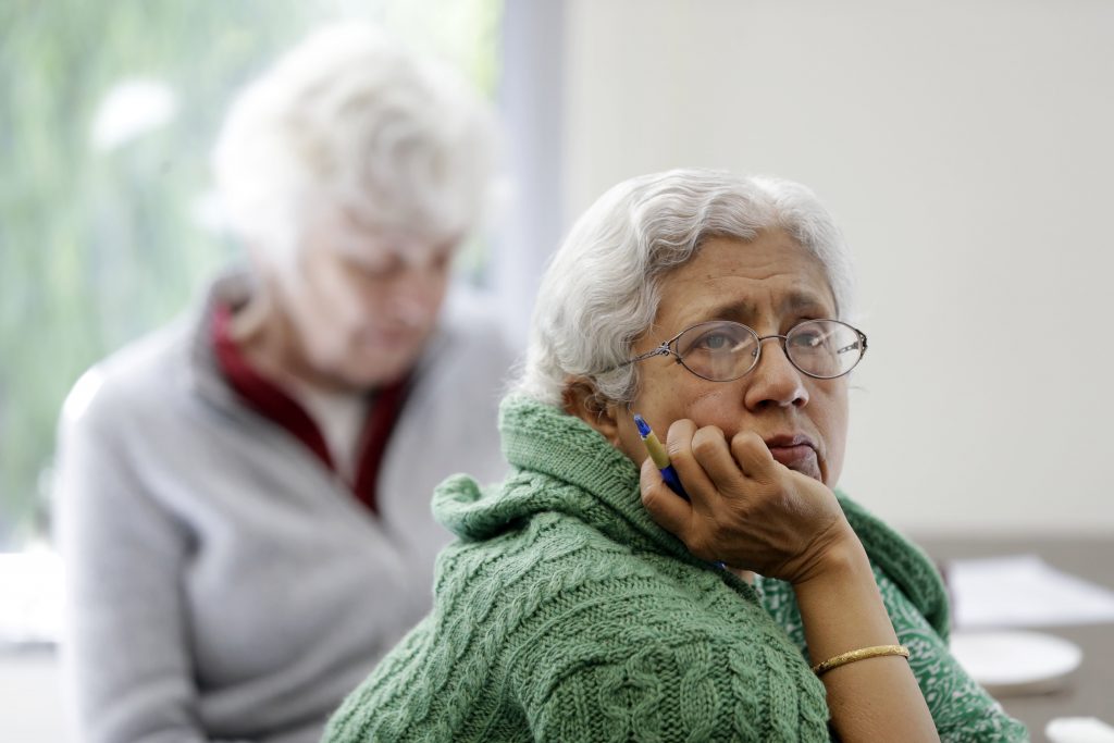 Sara Dhamija In this Friday, April 13, 2018 photo, Sara Dhamija, (right), listens to a teacher during an anti-bullying class at the On Lok 30th Street Senior Center in San Francisco. Nursing homes, senior centers and housing complexes for the elderly have introduced programs, training and policies aimed at curbing spates of bullying, an issue once thought the exclusive domain of the young. (Marcio Jose Sanchez/AP Photo)