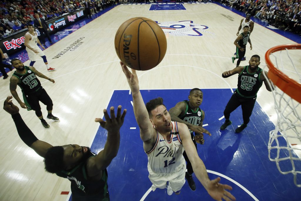 T.J. McConnell, Jaylen Brown, Terry Rozier Philadelphia 76ers' T.J. McConnell, center, goes up for a shot against Boston Celtics' Jaylen Brown, left, and Terry Rozier during the second half of Game 4 of an NBA basketball second-round playoff series, Monday, May 7, 2018, in Philadelphia. (AP Photo/Matt Slocum)