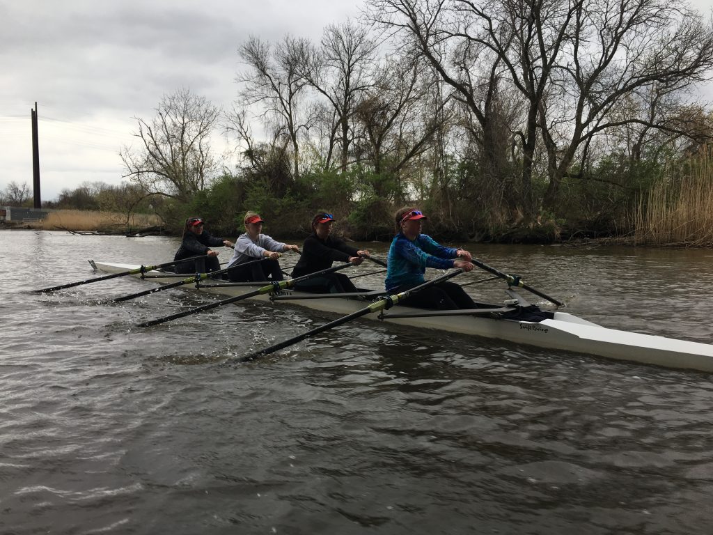 IMG_0337 Members of the Newport Rowing Club make their way down the Christina River near Wilmington. (Mark Eichmann/WHYY)