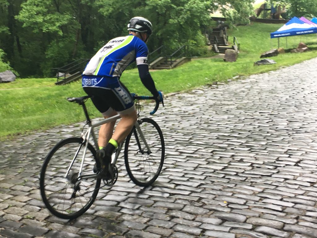 Brian Tibbits Injured Iraq war vet Brian Tibbits bikes his way up Monkey Hill in Wilmington in preparation for the Wilmington Grand Prix. (Mark Eichmann/WHYY)