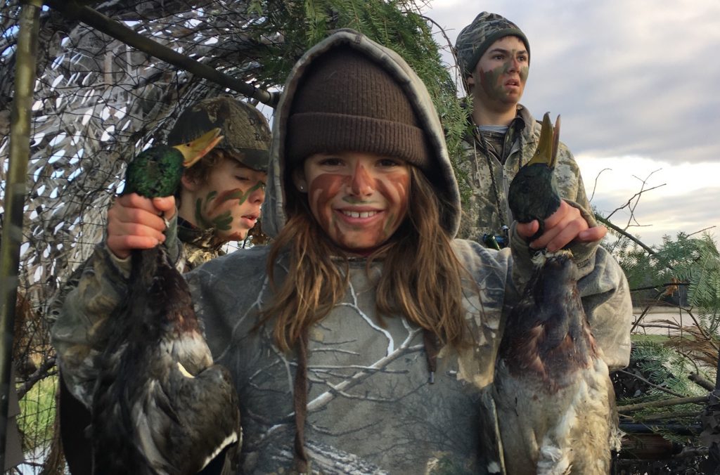 IMG_8757 Linde Lemerond proudly shows off a couple of the ducks that her brother, Nash, and their friend, Tanner Kocker, shot last fall. (Courtesy of Joe Lemerond)